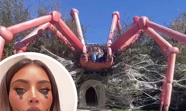 Kim Kardashian gives a tour of her home decked out for Halloween with a TARANTULA on of her house – Daily Mail