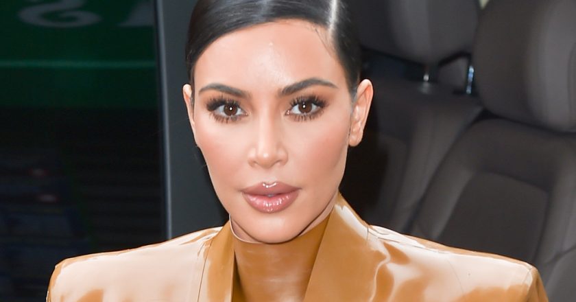 Kim Kardashian Poses in a Brown Leather Jumpsuit With Cut-Out Detailing Made by Yeezy Gap’s Design Director – Footwear News