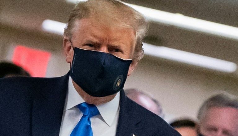 Trump finally dons mask as US sets new virus case record – Yahoo News