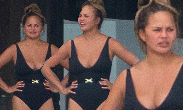 Chrissy Teigen wears swimsuit after breast implants removed – Daily Mail