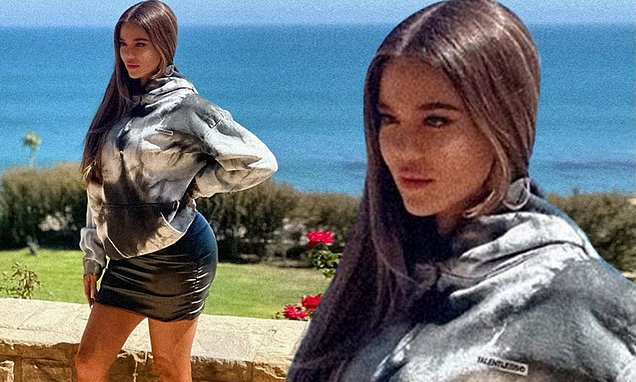 Khloe Kardashian looks unrecognizable as she models Scott Disicks Talentless brand hoodie – Daily Mail