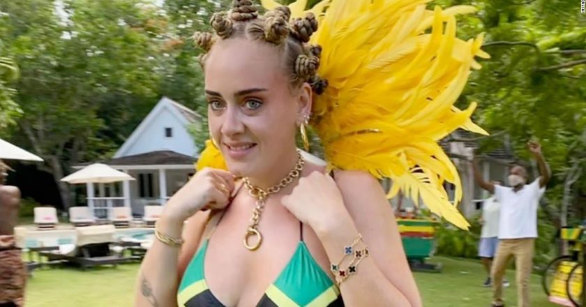 Heres why Adele was wearing Bantu knots, a Jamaican flag bikini top and other carnival wear – CNN