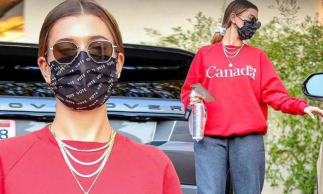 Hailey Bieber represents husband Justins home country in baggy Canada sweater on LA salon trip – Daily Mail