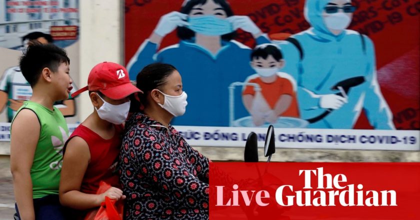 Coronavirus live news: US may begin vaccinations before Christmas; Vietnam sees first case in three months – The Guardian