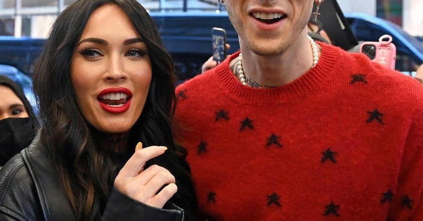 Machine Gun Kelly Proves Chivalry Isnt Dead as He Carries Megan Fox Into Crowded Studio – E! NEWS