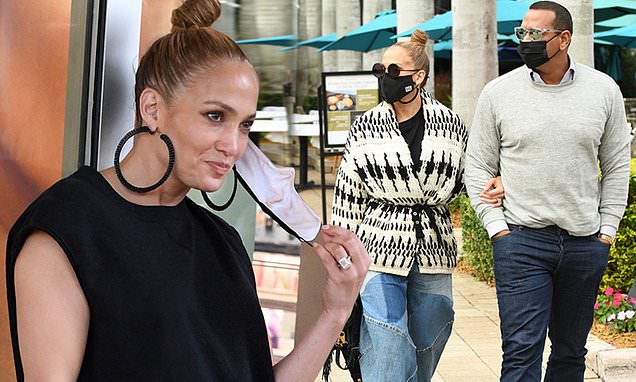 Jennifer Lopez wears wide-leg jeans and wrap sweater on Miami outing with Alex Rodriguez – Daily Mail