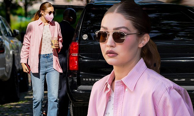 Gigi Hadid wears pink Ralph Lauren Oxford shirt on coffee run in NYC – Daily Mail