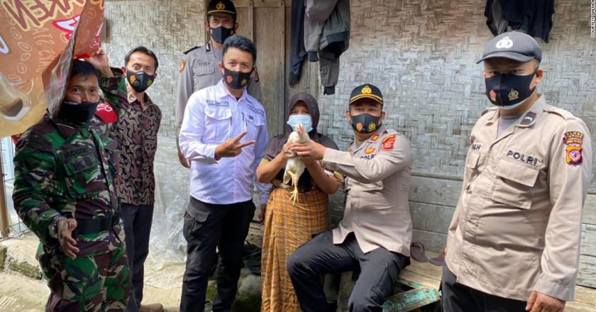 Indonesian officials give away live chickens to residents willing to get vaccinated – CNN