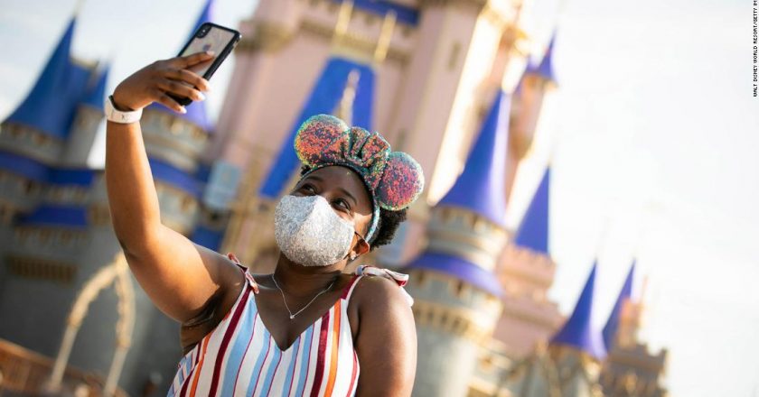 Disney World and Disneyland to again require masks indoors – CNN