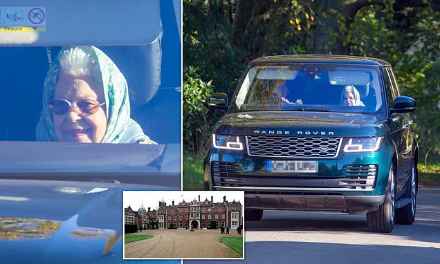 Queen is all smiles as she is driven around her Sandringham estate – Daily Mail