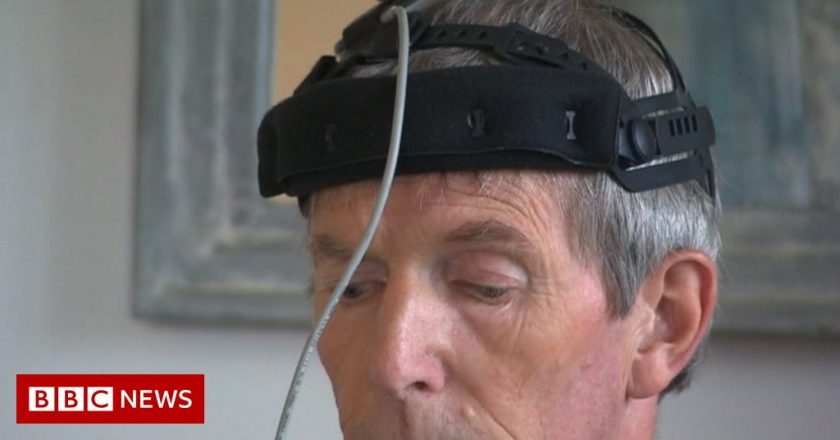 Parkinsons disease symptoms reversed by mini implant, trial suggests – BBC