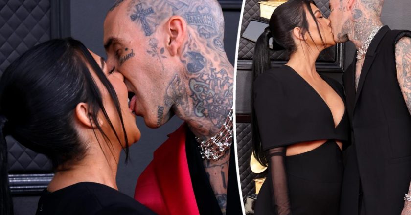 Kourtney Kardashian, Travis Barker play tonsil hockey on Grammys 2022 red carpet – Page Six